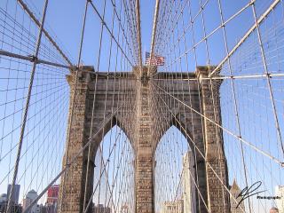 On a blue winter's day, a view from Brooklyn of the iconic Brooklyn Bridge.