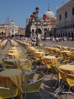 Venice's most famous place certainly has a lot of vacant seats.  This is a nice portrait shot of the world renown square on a beautiful Summer's day in 2009.