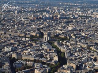 Up close, the Arc de Triumph is an tall and impressive arch, but a view of this famous Parisian landmark from atop the Eiffel Tower puts it into perspective. 