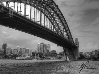 Just near Dawes Point Park, there is a nice view of North Sydney and Luna Park from underneath the massive shadow of the Harbour Bridge.